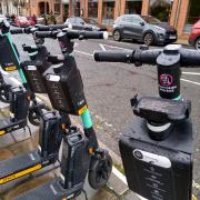 E-scooters showing the don't drink and drive warning in York city centre.