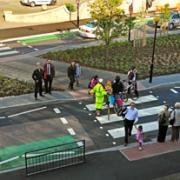Andy D’Agorne and fellow Green candidate Dave Taylor, in the hat, look over the new road layout outside Fishergate Primary School, York, where a 20mph speed limit now applies