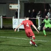 Selby's Jamie Danby bears down on goal against Parkgate.