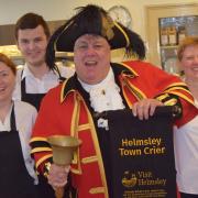 Flashback to Helmsley Town Crier David Hinde with his scroll at Porters Coffee shop