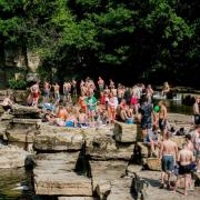 Crowds gather to enjoy the sun at Richmond falls