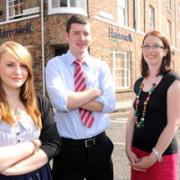 Harrowells new apprentices Sophie Elliott and James Manning, with Catherine Kew-Robson, head of HR