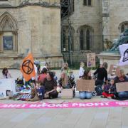 Activists from Extinction Rebellion Families York and Parents for Future York and North Yorkshire gathered outside York Minster to raise awareness of climate change