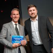 Sid Gornall being presented the Charity Fundraiser of the Year award by Liam Hattee from Delta Hotels by Marriot