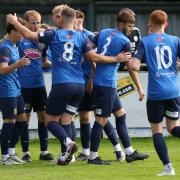 Tadcaster Albion players celebrate their opener in the 5-1 defeat to Emley.