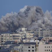 Smoke rises following an Israeli airstrike in Gaza City, Thursday, Oct. 12, 2023