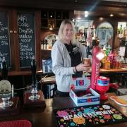 Anna Broadhurst pulls a pint at The Heworth