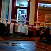 The police cordon close to BNT off licence and grocery shop on the corner of Nunthorpe Road in South Bank, York, on Christmas Day