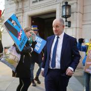 Post Office minister Kevin Hollinrake leaves the Millbank Studios in Westminster, central London, today (Wed, Jan 10)