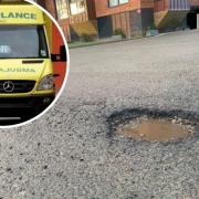 An ambulance attended after a cyclist hit a pothole in Terry Avenue, York