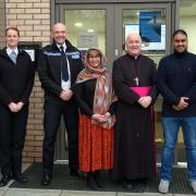 Archbishop Stephen, with his wife Rebecca, and Sergeant Arfan Rahouf, Assistant Chief Constable Catherine Clarke, Deputy Chief Constable Scott Bisset, Faisal Mohamudbuccus, and Acting Chief Constable Elliot Foskett