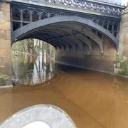 Flooding in Tower Gardens, York, under Skeldergate Bridge today (Friday, March 15)