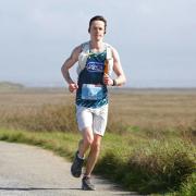 Jack McGuiness who is running marathons for the RSPCA