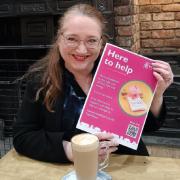 York celebrant Fiona Brown with the council's Here To Help flyer at The Yorkshire Barn at Murton where a money advice workshop for the bereaved is to be held on April 15. Image supplied