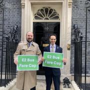 Richard Holden MP, who introduced the 2 bus fare cap, with Councillor George Jabbour outside 10 Downing Street in London