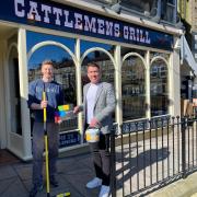 Harrogate BID Manager Matthew Chapman (right) with a staff member from Cattlemen’s Grill, which benefitted from the grant in 2023.