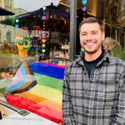 Impossible's business development manager Jack Vanston with the Pride window display