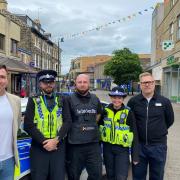 Picture caption: Harrogate BID Manager Matthew Chapman (left) Town Centre Support Officer Kiam Taylor (centre) and Mark Robson, store manager at Marks and Spencer (right) with representatives from North Yorkshire Police in Harrogate town centre.