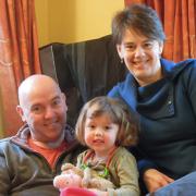 Paul Simpson with partner Kate Stainsby and their daughter, Hannah