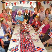 Patients and staff at St Leonard’s Hospice Daycare centre enjoy their Jubilee party