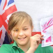 Mia Richardson with her winning portrait of the Queen