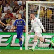 Wayne Rooney's (right) second-half winner set up a quarter-final clash against Italy