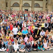 The massed choirs on the steps of the Castle Museum