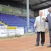 Ian Ashton shows off the facilities at Huntington Stadium to Lawrence Bruce, Gambia’s Olympics chief in 2010