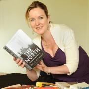 The University of York’s Joan Concannon with books by authors who will attend the York Festival of Ideas