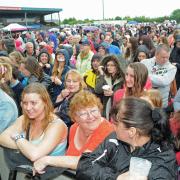 Crowds watch the opening performances  at the Grand Departy celebrations in Huntington Stadium
