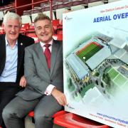 Manager Nigel Worthington and chairman Jason McGill with the plans for the new stadium
