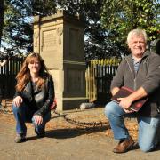 Dr Jon Kenny with fellow archaelogist Jane Stockdale and cameraman John Phillips at the Salisbury Terrace war memorial.