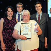 The Tour de Tang Hall team celebrates winning the Best Community Project Award at last year’s Community Pride Awards