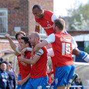 York City goal scorer Michael Coulson and team-mates celebrate during their victory over Newport County