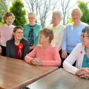 Rachael Maskell, the Labour candidate for York Central, with Hilary Benn, chats to a group of pensioners who met for lunch at the Carlton Tavern, Acomb