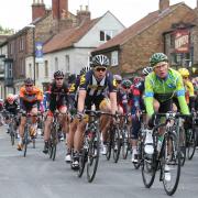 Riders in the Tour de Yorkshire pass through Norton