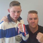 Yorkshire champion Lennox Tyers with York Boxing Club head coach Billy Wilson