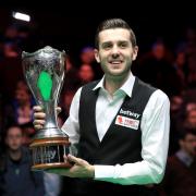 Mark Selby celebrates with the Betway UK Championship trophy after last year's victory over Ronnie O'Sullivan at the York Barbican