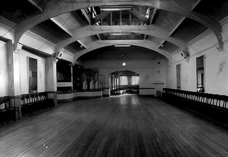 The Albany ballroom in Goodramgate pictured in 1950. It would later be taken over by the Hunter & Smallpage store. The resident band sign on the stage bears the name The Ambassadors.