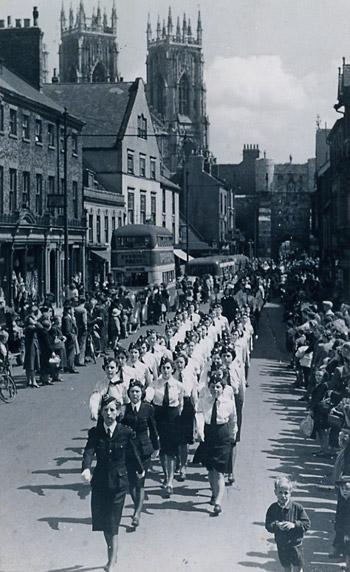 Crowds gather in Bootham for a parade in the 1960s.