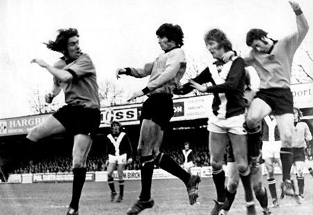 28/12/74 - York City 3, Hull City 0: Barry Swallow surrounded by Hull defenders as he tries to meet a corner. The ball beat the group, passing into the goalmouth where Hull defender Frank Banks headed off the line.