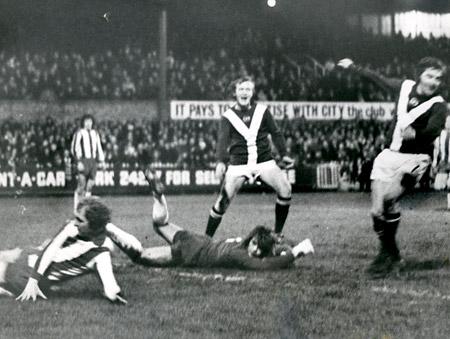 31/01/75 - York City 3, Sheffield Wednesday 0: Lyons joyfully side foots the ball into an empty net to the delight of Jimmy Seal.