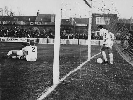 16/11/74 - York City 2, Millwall 1: Left back Eddie Jones shows his dejection as he retrieves the ball from the net after Chris Jones had put York ahead. Goalkeeper Brian King and right back David Donaldson are not very happy about the situation either.
