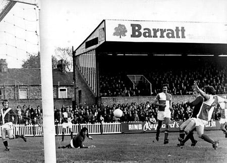 12/10/74 - York City 3, Bristol Rovers 0: Jimmy Seal hits the ball into the Bristol goal to score his second goal. Barry Lyons, who beat 'keeper Jim Eadie with his cross to leave him stranded, is on the left. Right back Jacobs' tackle is just too late.