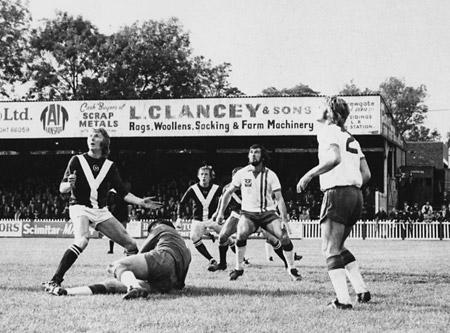 28/09/74 - York City 3, Portsmouth 0: Swallow and Portsmouth defenders keep thir eyes on the ball as, yet again, City swing into the attack.