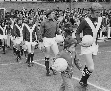 17/08/74 - York City 1, Aston Villa 1: Barry Swallow leads York city onto the Bootham turf for their first Second Division match.