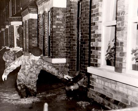 Soldiers wade through floods in Earlsborough Terrace, Marygate, York