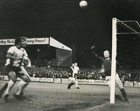 10/9/75 - York City 0, Liverpool 1 (League Cup 2nd round): Graeme Crawford pushes a shot from Kevin Keegan against the post with Ray Kennedy and Barry Swallow closing in.