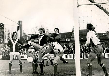 26/12/75 - York City 2, Blackburn Rovers 1: Anxious moment for Blackburn defender Fazackerley and Jonse as Barry Swallow swings at a corner.