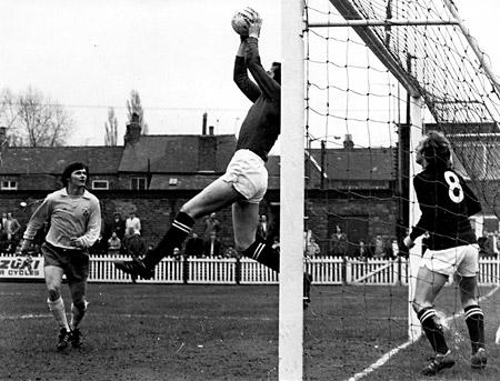 28/02/76 - York City 2, Southampton 1: Graeme Crawford goes up for a high ball as he is challenged by Bobby Stokes. Ian Holmes covers the City line.